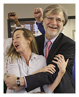 Milwaukee Journal Sentinel reporter Raquel Rutledge celebrates with editor Marty Kaiser in the newsroom after hearing she was awarded the Pulitzer Prize for local reporting Monday, April 12, 2010 at the paper in Milwaukee, Wis. The award was for investigating the $350 million taxpayer-financed child-care system known as Wisconsin Shares and uncovered a trail of phony companies, fake reports and shoddy oversight. (AP Photo/Milwaukee Journal Sentinel, Mark Hoffman)