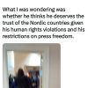 Tweet by Helle Lyng about PM Modi and an elevator, with a photo of people in business attire walking through a hallway toward an elevator.
