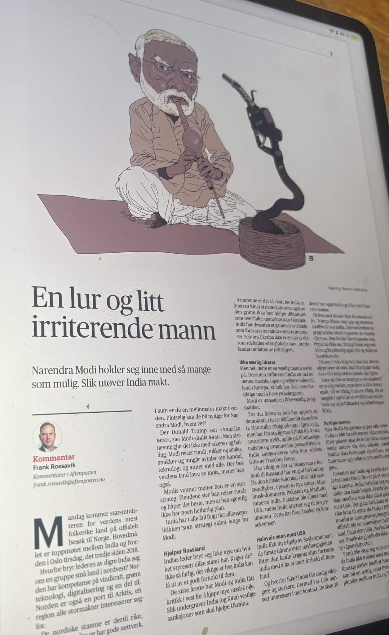Political cartoon of Narendra Modi with white beard, sitting cross-legged on a mat and smoking a long pipe connected to a hookah in a newspaper illustration.