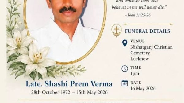 Funeral memorial card with a photo of Shashi Prem Verma, surrounded by lilies, a cross, and a dove; includes birth/death dates, 'In Loving Memory' and family grief notes.
