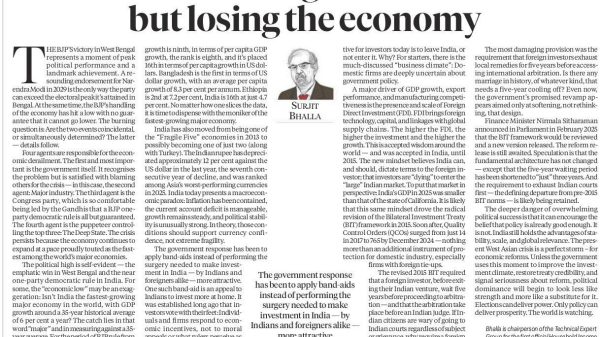 Newspaper front page with bold headline 'BJP is winning the elections but losing the economy' and a portrait of Surjit Bhalla.