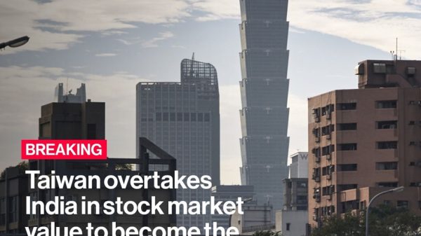 Breaking news: Taiwan overtakes India to become the fifth-largest stock market, with Taipei 101 and city skyline in view (Bloomberg)