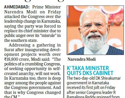 Close-up portrait of a senior man in a blue checked suit, on a newspaper page accompanying a political leadership article.