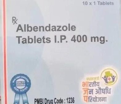Box of Albendazole tablets 400 mg (Rx), 10 x 1 tablets, with PMBI code 1236 and official logos on the packaging
