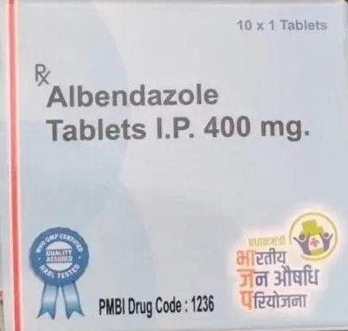 Box of Albendazole tablets 400 mg (Rx), 10 x 1 tablets, with PMBI code 1236 and official logos on the packaging