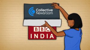 Woman hangs a 'Collective Newsroom' sign over a red 'BBC INDIA' panel on a beige brick wall, indicating a media collaboration or branding event.