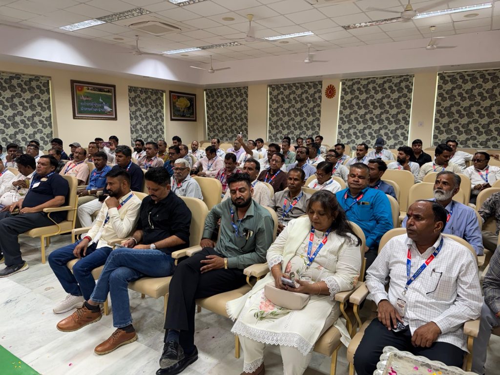 ifwj | No. 1 Indian Media News Portal Large conference room filled with attendees seated in rows, many wearing lanyards for a seminar or training event.