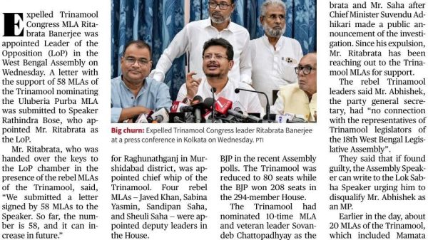 Newspaper front page with the headline 'Expelled Trinamool MLA is LoP in Bengal Assembly' and a group of men at a press conference setting in front of microphones.