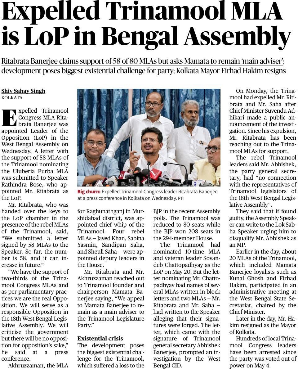Newspaper front page with the headline 'Expelled Trinamool MLA is LoP in Bengal Assembly' and a group of men at a press conference setting in front of microphones.