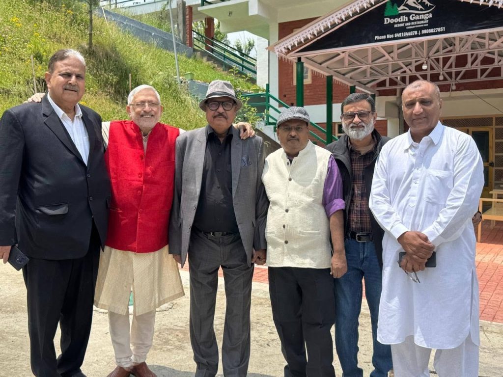 khabranvees_2 | No. 1 Indian Media News Portal Six men pose together outdoors in front of a restaurant, smiling for a group photo.