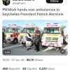 Tweet image: two men shake hands beside three red-and-white ambulances, announcing PM Modi handing over ambulances to Seychelles president Patrick Herminie.