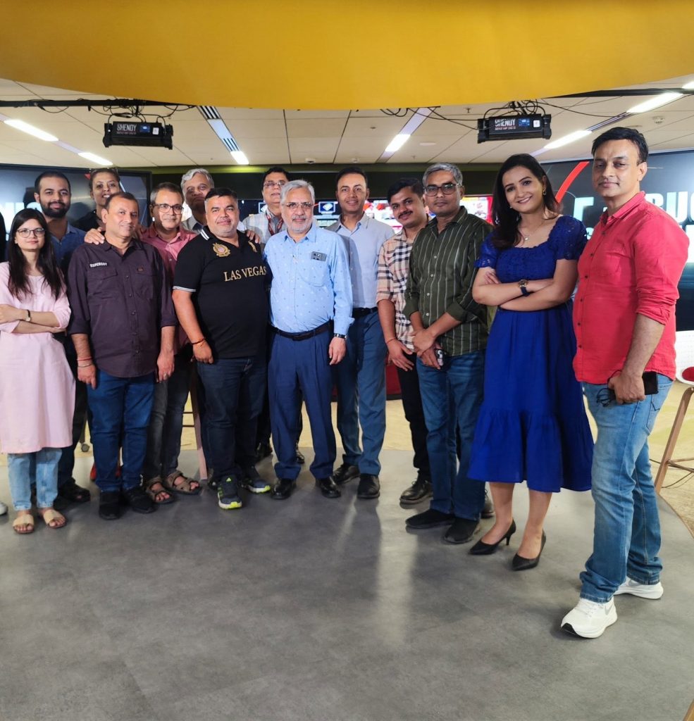 priyadarshan | No. 1 Indian Media News Portal Group of coworkers posing for a photo in a modern office lobby.