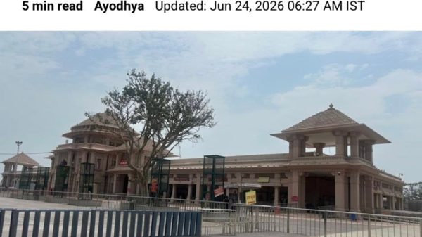 News article header from The Indian Express with large headline and author byline, followed by an image of the counting centre building captioned 'The building which houses the counting centre'.
