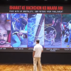 Man facing a large screen infographic titled 'Bharat ke Bachchon ko Maara Hai' showing five acts of brutality: pellet guns, shock batons, lathis, beating women and minors, and plain-clothes officers.