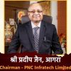 Portrait of a man in a dark suit and tie, seated in an office, identified as Chairman of PNC Infratech Limited (text on banner)