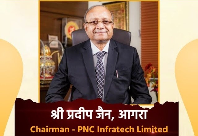 Portrait of a man in a dark suit and tie, seated in an office, identified as Chairman of PNC Infratech Limited (text on banner)