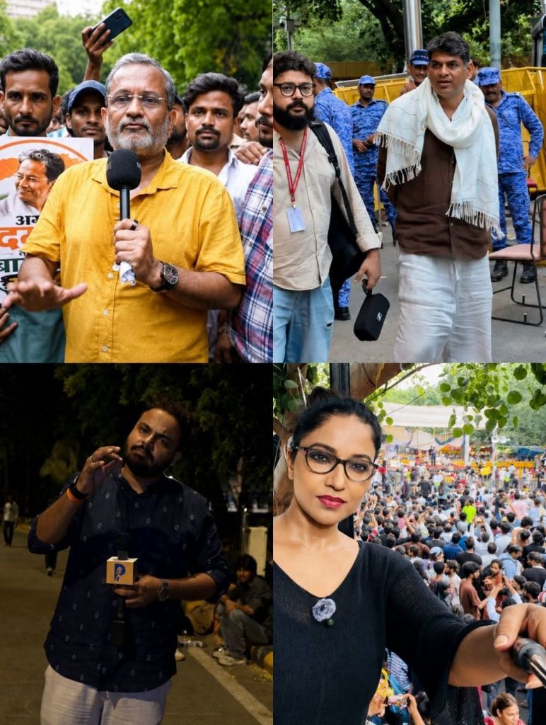 swatantra patrakar | No. 1 Indian Media News Portal Protest scene: man in a yellow shirt speaks into a microphone at a daytime rally with supporters behind him.