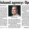 Newspaper front page with the headline 'Disband agency: Opp' and a photo of Rahul Gandhi beside the article text.