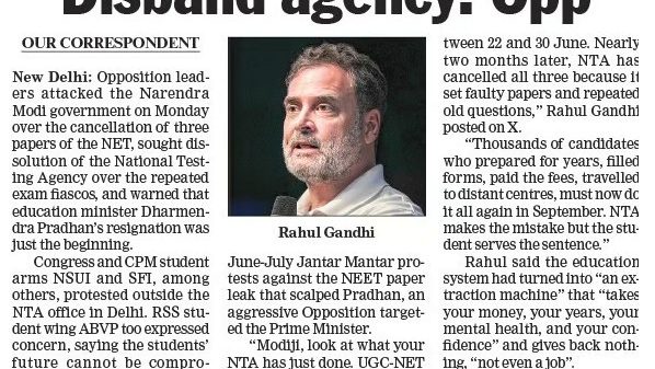 Newspaper front page with the headline 'Disband agency: Opp' and a photo of Rahul Gandhi beside the article text.