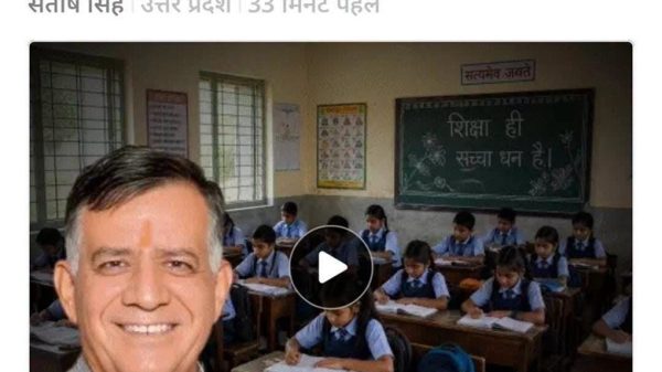 News image: classroom with uniformed students at desks; a large smiling man’s portrait appears in the foreground (overlay)