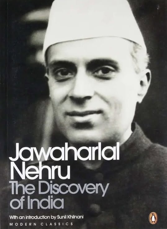 nehru | No. 1 Indian Media News Portal Book cover for The Discovery of India featuring a black-and-white portrait of Jawaharlal Nehru wearing a white cap, title text overlaid.