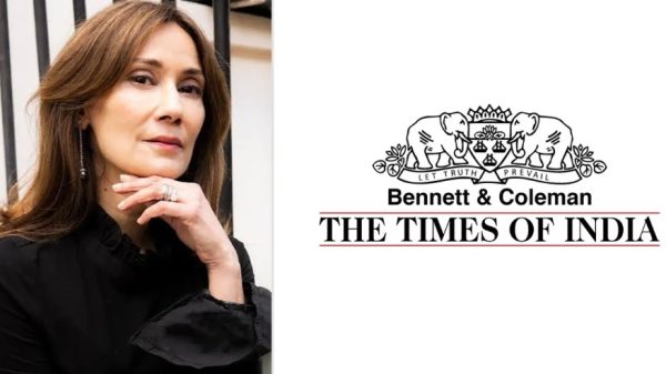Head-and-shoulders portrait of a woman in a black blouse beside The Times of India Bennett & Coleman emblem on a white background.