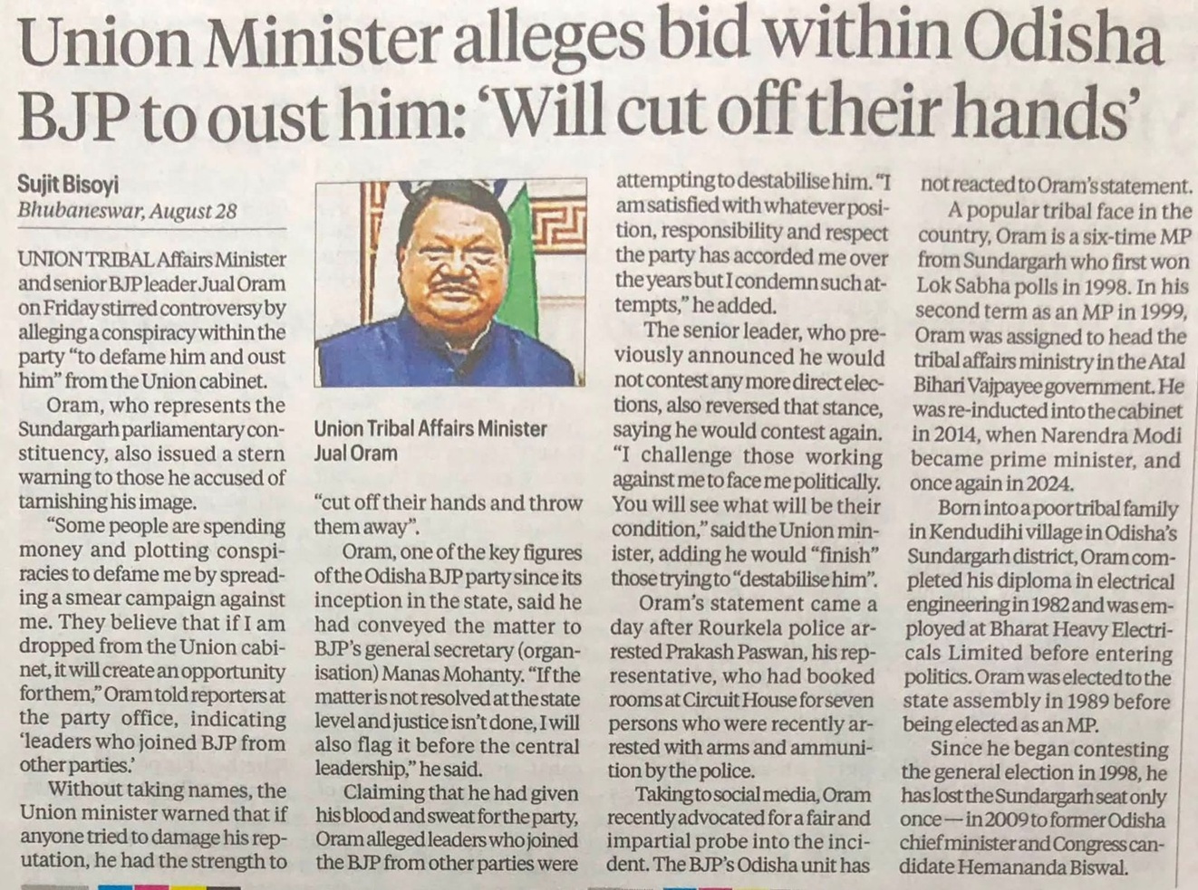 Newspaper article about Union Tribal Affairs Minister Jual Oram alleging Odisha BJP members plot to oust him; photo of Oram in the center.