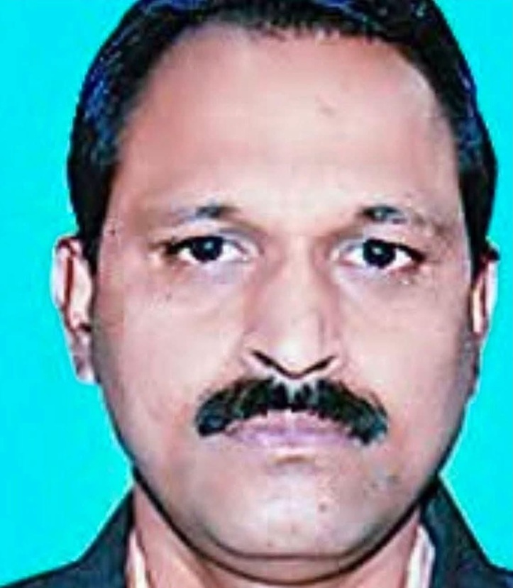 rajesh sonkar | No. 1 Indian Media News Portal Close-up portrait of a man with a dark mustache against a bright blue background.