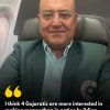Portrait of a bald man in a green blazer on an airplane seat, overlaid with a quote about Gujaratis and money attributed to Sabeer Bhatia.