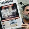 Man with gray beard holds a Tehelka newspaper showing a large central image and bold headline front page.