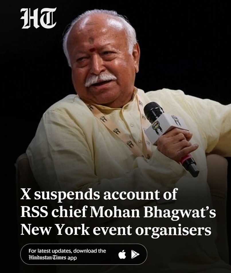 An older man with white hair and mustache sits on stage, holding a microphone, wearing a pale yellow shirt; a bold headline overlays the image about X suspending the RSS chief Mohan Bhagwat’s New York event organizers.