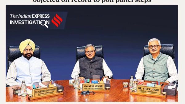 Three Indian election commissioners seated at a desk during a press briefing, with nameplates in front and a headline about objections to poll panel steps above them.