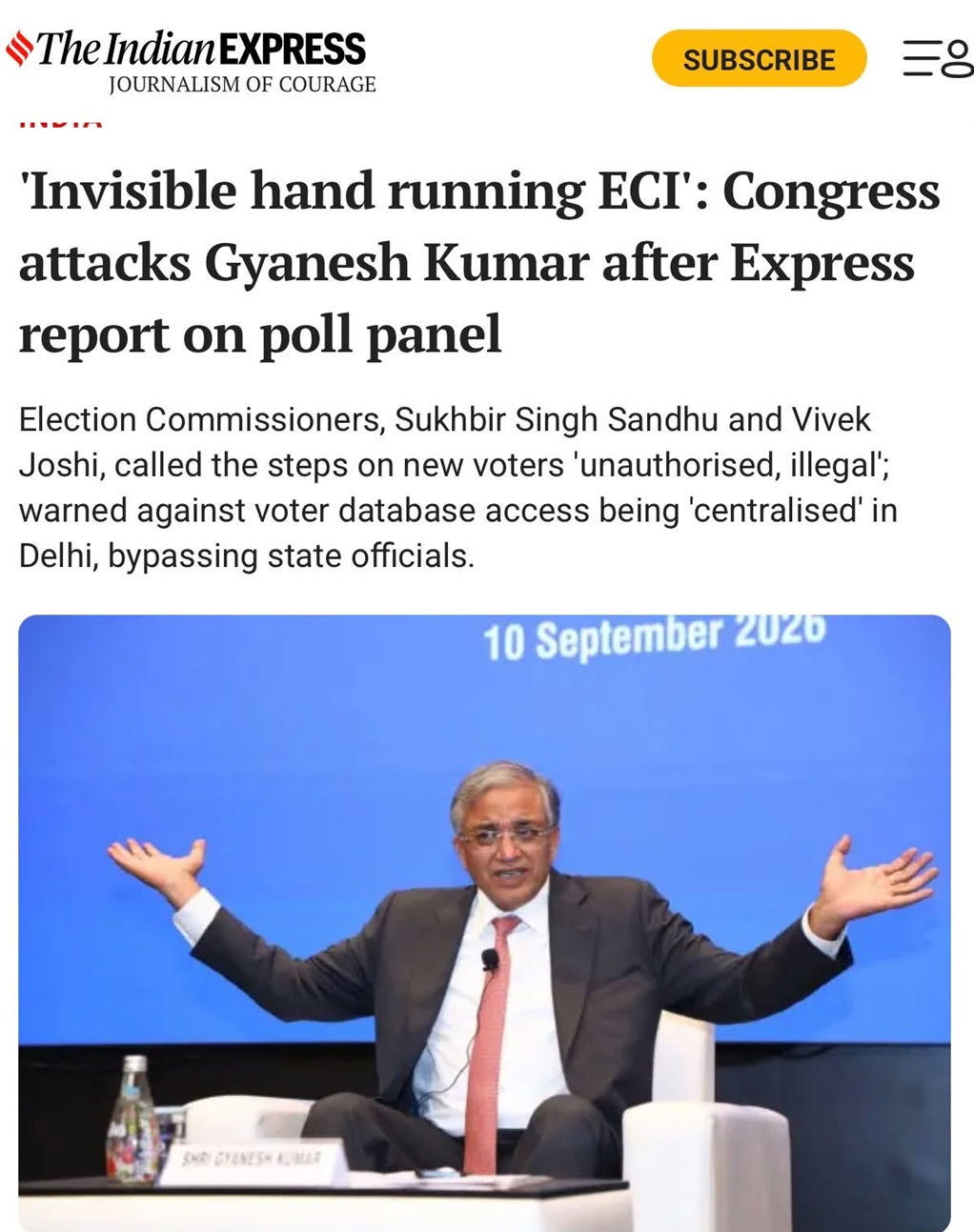 Screenshot | No. 1 Indian Media News Portal News image: man in a dark suit with pink tie on stage, arms raised, blue backdrop reading 10 September 2026.