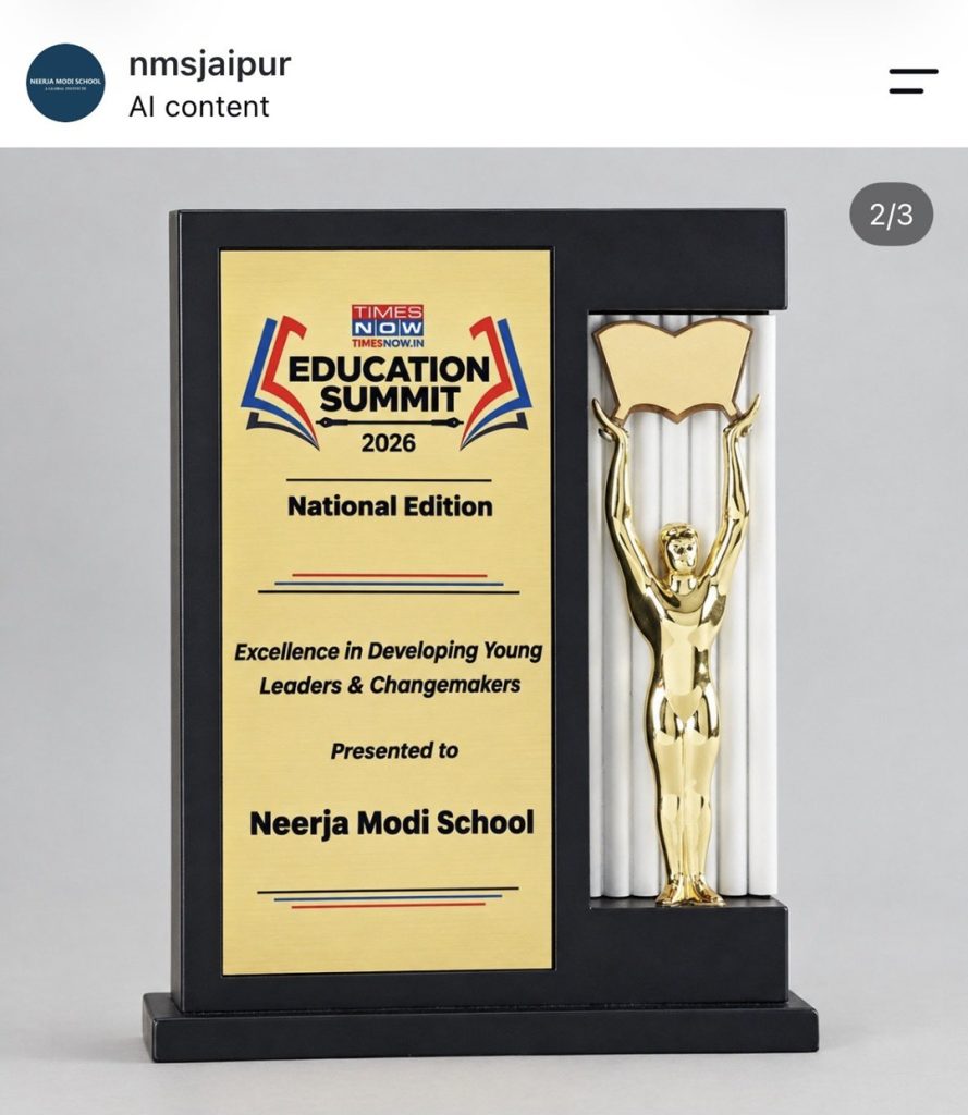 neerja modi | No. 1 Indian Media News Portal Award trophy featuring a gold plaque reading 'Education Summit 2026 National Edition' presented to Neerja Modi School, with a gold statue standing beside the plaque.