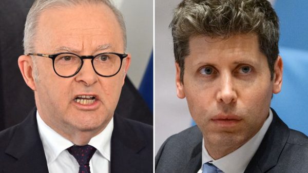 Split-screen image of two men in suits: left is an older man with glasses speaking, right is a younger man listening, both in formal attire at a press-like setting.