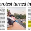 Newspaper front page with the headline 'When covering a protest turned into fight for survival,' featuring a photo of a protest on a roadside and highlighted quotes in the article area.