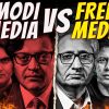 A split poster showing Modi on the left and free media on the right with bold 'MODI vs FREE MEDIA' text, flames at bottom.