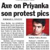 Newspaper article about Priyanka Gandhi protest photos, showing a blank red wall and a portrait of Raihan Vadra.
