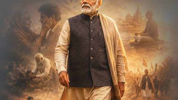 Film poster featuring a senior man in traditional Indian clothing walking forward, with a crowd and Indian scenery in the background and a golden title at the top.